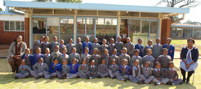 Above: Mrs Tsanga and Mrs Mawadza with Grade 1 Blue class 2015
