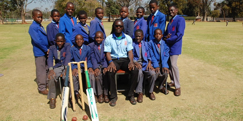 Coach Hega and the senior cricket team